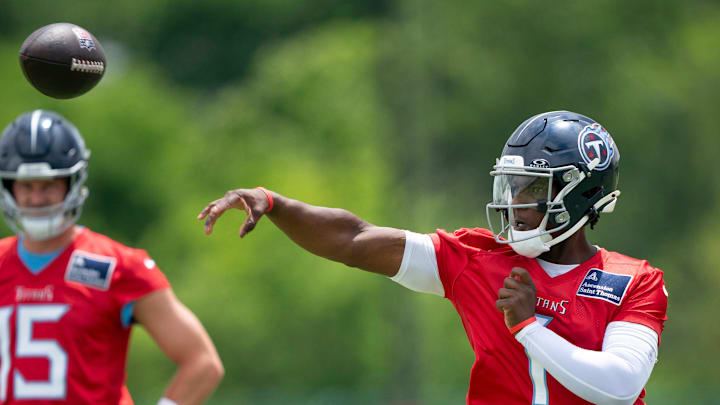 Tennessee Titans quarterback Cam Ward (1) throws in drills during OTAs at Ascension Saint Thomas Sports Park in Nashville, Tenn., Wednesday, May 28, 2025.