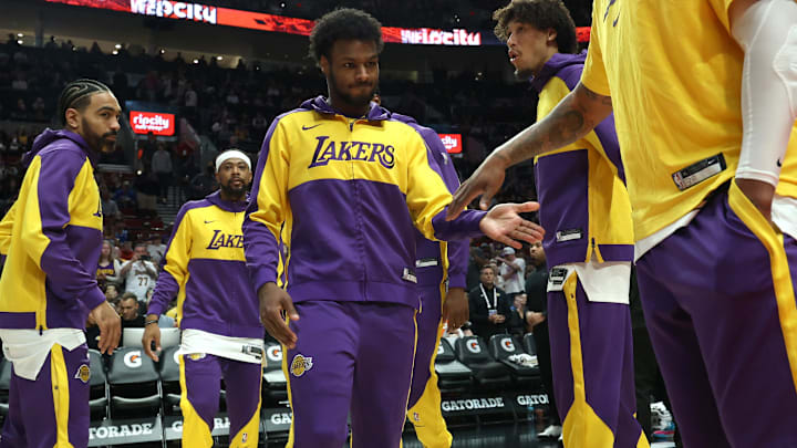 Apr 13, 2025; Portland, Oregon, USA;  Los Angeles Lakers guard Bronny James (9) enters the line up before playing in a game against the Portland Trail Blazers at Moda Center. Mandatory Credit: Jaime Valdez-Imagn Images