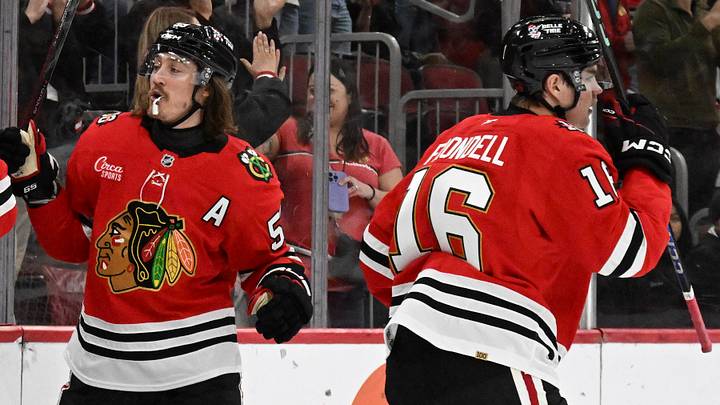 Apr 9, 2026; Chicago, Illinois, USA;  Chicago Blackhawks center Anton Frondell (16) celebrates his goal against the Carolina Hurricanes during the first period at the United Center. Mandatory Credit: Matt Marton-Imagn Images