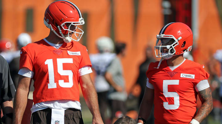 Cleveland Browns quarterbacks Joe Flacco (15) and Dillon Gabriel (5) chat during training camp July 23, 2025, in Berea.