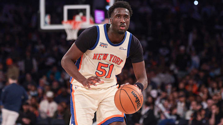 Knicks forward Mohamed Diawara dribbles up the court.