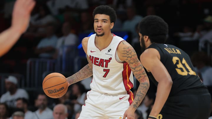 Apr 26, 2025; Miami, Florida, USA; Miami Heat center Kel'el Ware (7) dribbles the basketball as Cleveland Cavaliers center Jarrett Allen (31) defends in the third quarter during game three for the first round of the 2025 NBA Playoffs at Kaseya Center. Mandatory Credit: Sam Navarro-Imagn Images Apr 26, 2025; Miami, Florida, USA; Miami Heat center Kel'el Ware (7) dribbles the basketball as Cleveland Cavaliers center Jarrett Allen (31) defends in the third quarter during game three for the first round of the 2025 NBA Playoffs at Kaseya Center. Mandatory Credit: Sam Navarro-Imagn Images