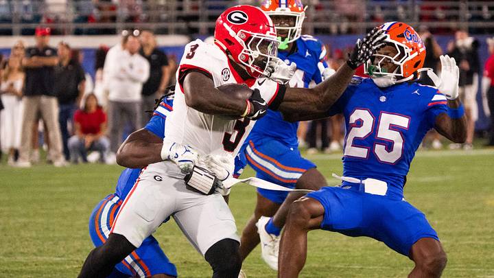Georgia Bulldogs running back Nate Frazier (3) pushes off Florida Gators defensive back Cormani McClain (25) in the second half in an NCAA football game, Saturday, Nov. 1, 2025, at EverBank Stadium in Jacksonville, Fla. Georgia defeated Florida 24-20. [Doug Engle/Florida Times-Union]