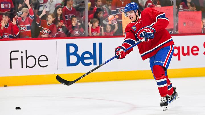 Sep 30, 2023; Montreal, Quebec, CAN; Montreal Canadiens defenseman David Reinbacher (64) shoots a puck during warm-up before the game against the Toronto Maple Leafs at Bell Centre. Mandatory Credit: David Kirouac-USA TODAY Sports Sep 30, 2023; Montreal, Quebec, CAN; Montreal Canadiens defenseman David Reinbacher (64) shoots a puck during warm-up before the game against the Toronto Maple Leafs at Bell Centre. Mandatory Credit: David Kirouac-USA TODAY Sports