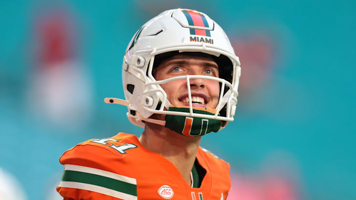 Oct 17, 2025; Miami Gardens, Florida, USA; Miami Hurricanes quarterback Carson Beck (11) looks on from the field before the game against the Louisville Cardinals at Hard Rock Stadium. Mandatory Credit: Sam Navarro-Imagn Images