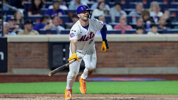 Sep 17, 2024; New York City, New York, USA; New York Mets first baseman Pete Alonso (20) follows through on a double against the Washington Nationals during the fifth inning at Citi Field. Mandatory Credit: Brad Penner-Imagn Images