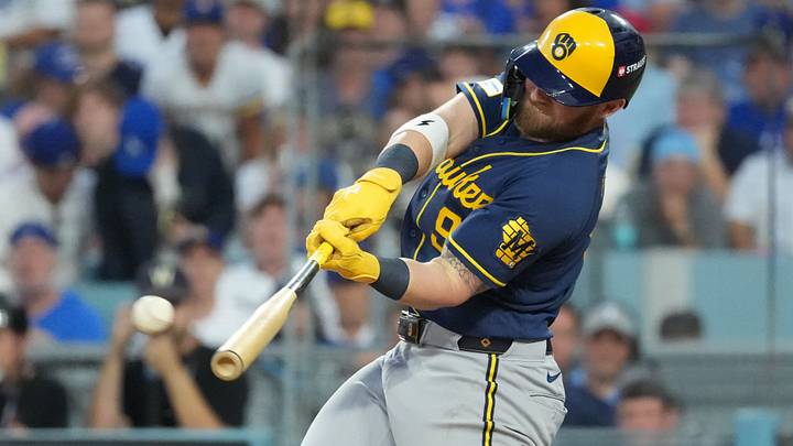 Oct 15, 2026; Los Angeles, California, USA;  Milwaukee Brewers first baseman Jake Bauers (9) doubles during the fourth inning against the Los Angeles Dodgers in game four of the NLCS for the 2026 MLB Playoffs at Uniqlo Field at Dodger Stadium.  Mandatory Credit: Kirby Lee-Imagn Images