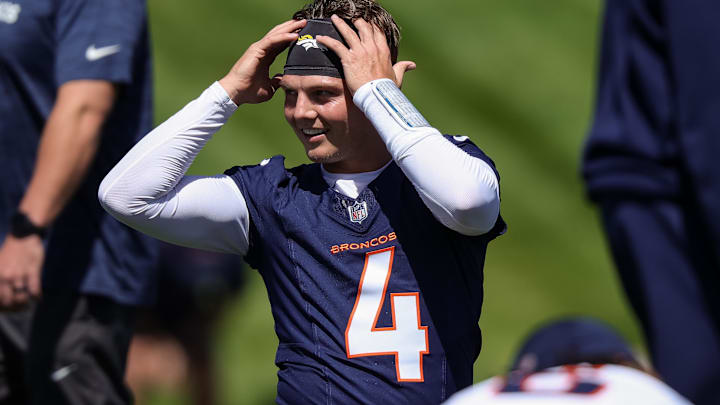 Denver Broncos quarterback Zach Wilson (4) during organized team activities at Centura Health Training Center.