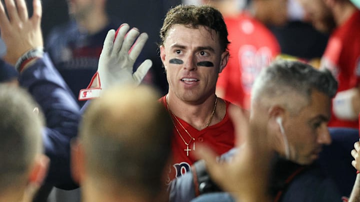 Sep 19, 2025; Tampa, Florida, USA;  Boston Red Sox second baseman Romy Gonzalez (23) is congratulated in the dugout after scoring during the eighth inning against the Tampa Bay Rays at George M. Steinbrenner Field. Mandatory Credit: Kim Klement Neitzel-Imagn Images