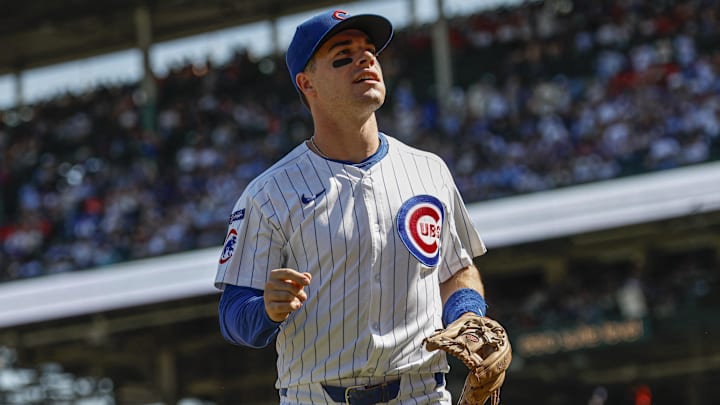 Sep 27, 2025; Chicago, Illinois, USA; Chicago Cubs third baseman Matt Shaw (6) runs back to the dugout during the first inning of a baseball game against the St. Louis Cardinals at Wrigley Field. 