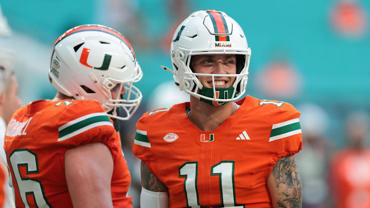 Sep 6, 2025; Miami Gardens, Florida, USA; Miami Hurricanes quarterback Carson Beck (11) reacts on the field before the game against the Bethune-Cookman Wildcats at Hard Rock Stadium. Mandatory Credit: Sam Navarro-Imagn Images
