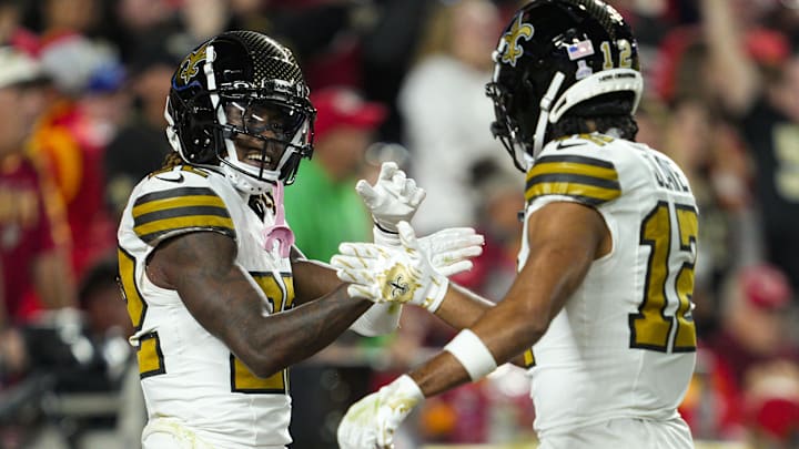 Oct 7, 2024; Kansas City, Missouri, USA; New Orleans Saints wide receiver Rashid Shaheed (22) celebrates with wide receiver Chris Olave (12) after scoring a touchdown during the first half against the Kansas City Chiefs at GEHA Field at Arrowhead Stadium. Mandatory Credit: Jay Biggerstaff-Imagn Images Oct 7, 2024; Kansas City, Missouri, USA; New Orleans Saints wide receiver Rashid Shaheed (22) celebrates with wide receiver Chris Olave (12) after scoring a touchdown during the first half against the Kansas City Chiefs at GEHA Field at Arrowhead Stadium. Mandatory Credit: Jay Biggerstaff-Imagn Images
