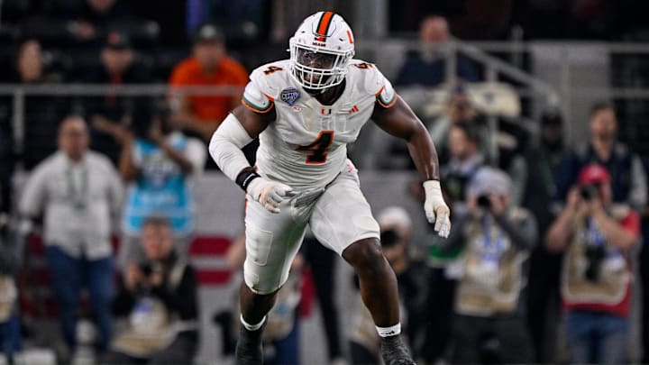Dec 31, 2025; Arlington, TX, USA; Miami Hurricanes defensive lineman Rueben Bain Jr. (4) rushes the line during the 2025 Cotton Bowl and quarterfinal game of the College Football Playoff at AT&T Stadium. Mandatory Credit: Jerome Miron-Imagn Images Dec 31, 2025; Arlington, TX, USA; Miami Hurricanes defensive lineman Rueben Bain Jr. (4) rushes the line during the 2025 Cotton Bowl and quarterfinal game of the College Football Playoff at AT&T Stadium. Mandatory Credit: Jerome Miron-Imagn Images