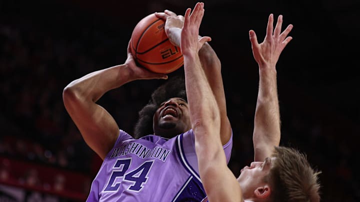 Lathan Sommerville (24) goes to the basket against his old team in Tuesday's game in Piscataway, New Jersey. 
