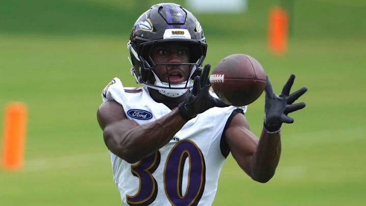 Jul 24, 2025; Owings Mills, MD, USA; Baltimore Ravens cornerback Reuben Lowery (30) runs drills during training camp at the Under Armour Performance Center. Mandatory Credit: Mitch Stringer-Imagn Images
