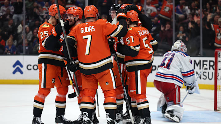 Jan 19, 2026; Anaheim, California, USA; Anaheim Ducks left wing Jeffrey Viel (second from left) celebrates with Ryan Poehling (25) and Radko Gudas (7) and Olen Zellweger (51) after scoring a goal during the second period against the New York Rangers at Honda Center. Mandatory Credit: Kiyoshi Mio-Imagn Images Jan 19, 2026; Anaheim, California, USA; Anaheim Ducks left wing Jeffrey Viel (second from left) celebrates with Ryan Poehling (25) and Radko Gudas (7) and Olen Zellweger (51) after scoring a goal during the second period against the New York Rangers at Honda Center. Mandatory Credit: Kiyoshi Mio-Imagn Images
