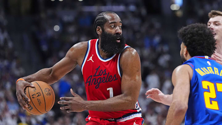 May 3, 2025; Denver, Colorado, USA; LA Clippers guard James Harden (1) prepares to pass the ball in the second quarter against the Denver Nuggets during game seven of first round for the 2025 NBA Playoffs at Ball Arena. Mandatory Credit: Ron Chenoy-Imagn Images