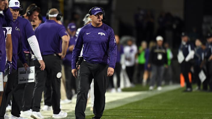 Oct 12, 2024; Boulder, Colorado, USA; Kansas State Wildcats head coach Chris Klieman looks on from the sideline during the first half against the Colorado Buffaloes at Folsom Field. Mandatory Credit: Christopher Hanewinckel-Imagn Images