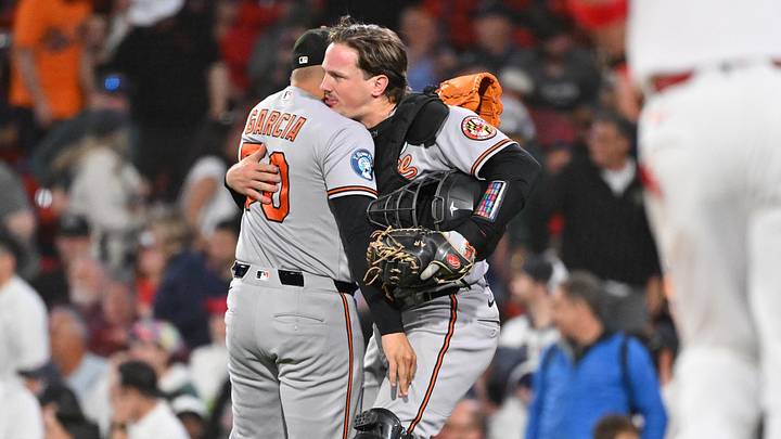 Jun 2, 2026; Boston, Massachusetts, USA; Baltimore Orioles catcher Adley Rutschman (35) and relief pitcher Rico Garcia (50) celebrate beating the Boston Red Sox at Fenway Park. Mandatory Credit: Eric Canha-Imagn Images Jun 2, 2026; Boston, Massachusetts, USA; Baltimore Orioles catcher Adley Rutschman (35) and relief pitcher Rico Garcia (50) celebrate beating the Boston Red Sox at Fenway Park. Mandatory Credit: Eric Canha-Imagn Images