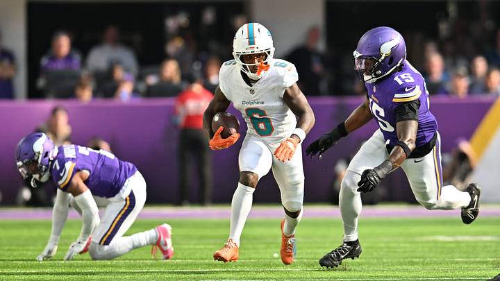 Miami Dolphins wide receiver Malik Washington (6) runs after making a catch as Minnesota Vikings linebacker Dallas Turner (15) defends during the first quarter at U.S. Bank Stadium in Week 4. Miami Dolphins wide receiver Malik Washington (6) runs after making a catch as Minnesota Vikings linebacker Dallas Turner (15) defends during the first quarter at U.S. Bank Stadium in Week 4.