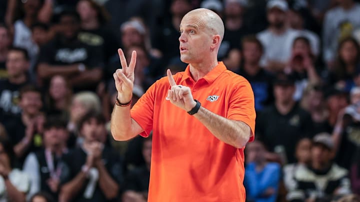 Mar 5, 2025; Orlando, Florida, USA; Oklahoma State Cowboys head coach Steve Lutz motions to the court during the first half against the UCF Knights at Addition Financial Arena. Mandatory Credit: Mike Watters-Imagn Images