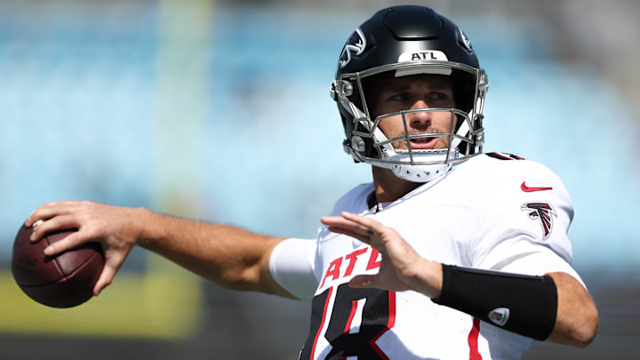 Sep 21, 2025; Charlotte, North Carolina, USA; Atlanta Falcons quarterback Kirk Cousins (18) warms up before a game between Carolina Panthers and the Atlanta Falcons at Bank of America Stadium. Mandatory Credit: Cory Knowlton-Imagn Images