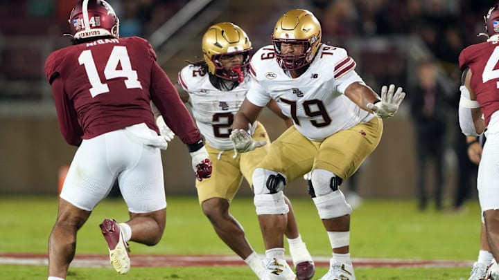 Sep 13, 2025; Stanford, California, USA; Boston College Eagles offensive lineman Kevin Cline (79) blocks against Stanford Cardinal linebacker Wilfredo Aybar (14) during the second quarter at Stanford Stadium. Mandatory Credit: Darren Yamashita-Imagn Images
