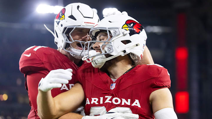 Aug 23, 2025; Glendale, Arizona, USA; Arizona Cardinals wide receiver Simi Fehoko (80) celebrates a touchdown with teammate Travis Vokolek (81) against the Las Vegas Raiders during a preseason NFL game at State Farm Stadium. Mandatory Credit: Mark J. Rebilas-Imagn Images
Aug 23, 2025; Glendale, Arizona, USA; Arizona Cardinals wide receiver Simi Fehoko (80) celebrates a touchdown with teammate Travis Vokolek (81) against the Las Vegas Raiders during a preseason NFL game at State Farm Stadium. Mandatory Credit: Mark J. Rebilas-Imagn Images