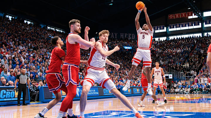 Arizona Wildcats guard KJ Lewis (5) shoots the ball during the first half against the Kansas Jayhawks at Allen Fieldhouse.