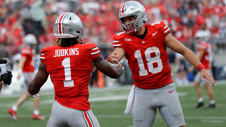 Aug 31, 2024; Columbus, Ohio, USA;  Ohio State Buckeyes running back Quinshon Judkins (1) celebrates with quarterback Will Howard (18) after a touchdown against the Akron Zips during the second half at Ohio Stadium.