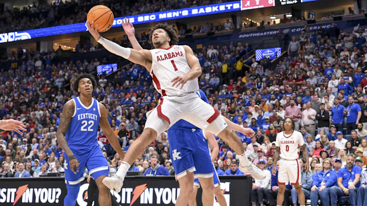 Mar 14, 2025; Nashville, TN, USA;  Alabama Crimson Tide guard Mark Sears (1) lays the ball in against the Kentucky Wildcats during the first half at Bridgestone Arena. Mandatory Credit: Steve Roberts-Imagn Images
