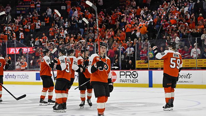 Apr 14, 2026; Philadelphia, Pennsylvania, USA; Philadelphia Flyers center Denver Barkey (52) and teammates acknowledge the crowd after win against the Montreal Canadiens at Xfinity Mobile Arena.