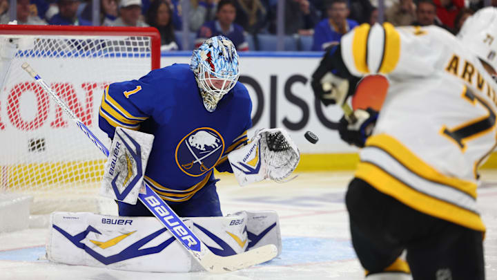 Apr 21, 2026; Buffalo, New York, USA; Boston Bruins left wing Viktor Arvidsson (71) scores a goal on Buffalo Sabres goaltender Ukko-Pekka Luukkonen (1) during the third period in game two of the first round of the 2026 Stanley Cup Playoffs at KeyBank Center. Mandatory Credit: Timothy T. Ludwig-Imagn Images
