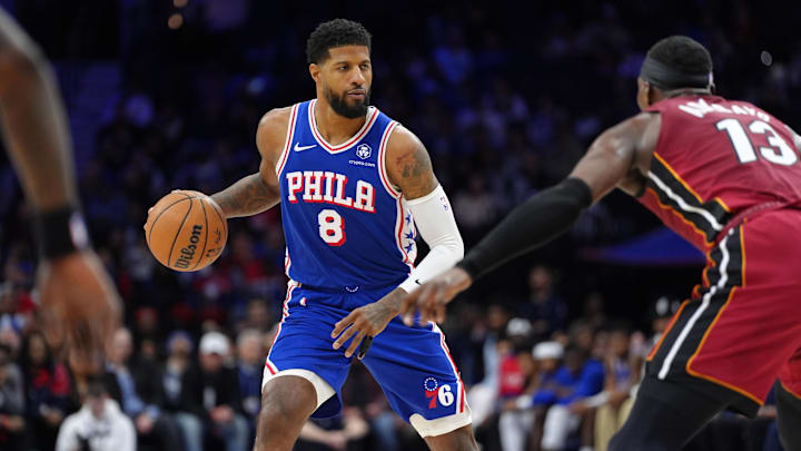 Feb 5, 2025; Philadelphia, Pennsylvania, USA; Philadelphia 76ers forward Paul George (8) controls the ball against the Miami Heat in the fourth quarter at Wells Fargo Center. Mandatory Credit: Kyle Ross-Imagn Images