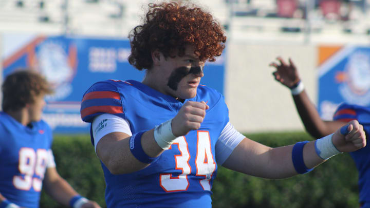 Bolles defensive end Asher Ghioto (34) stretches in warmups before a high school football game against St. Augustine on Sept. 5, 2025. [Clayton Freeman/Florida Times-Union]