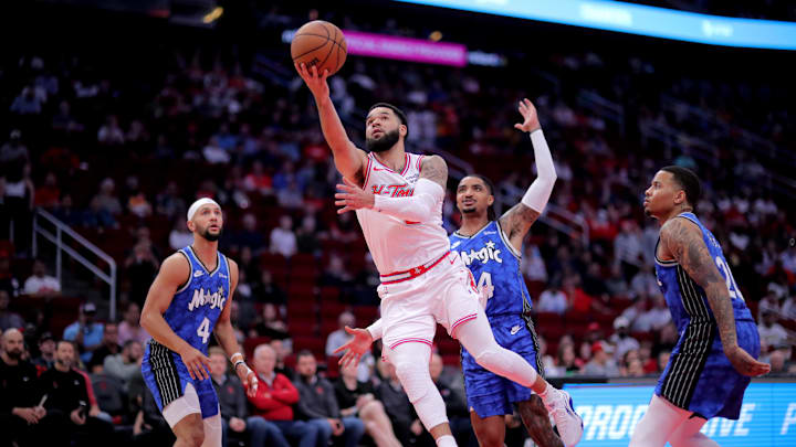 Apr 9, 2024; Houston, Texas, USA; Houston Rockets guard Fred VanVleet (5) makes a layup against the Orlando Magic Apr 9, 2024; Houston, Texas, USA; Houston Rockets guard Fred VanVleet (5) makes a layup against the Orlando Magic