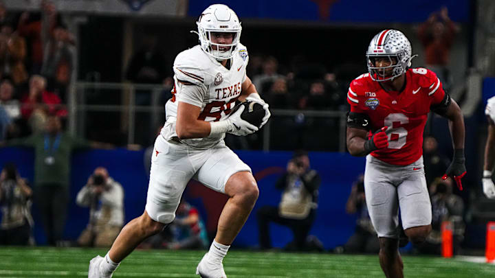 Texas Longhorns tight end Gunnar Helm (85) runs the ball during the College Football Playoff semifinal game against Ohio State in the Cotton Bowl at AT&T Stadium on Friday, Jan. 10, 2024 in Arlington, Texas. Texas Longhorns tight end Gunnar Helm (85) runs the ball during the College Football Playoff semifinal game against Ohio State in the Cotton Bowl at AT&T Stadium on Friday, Jan. 10, 2024 in Arlington, Texas.