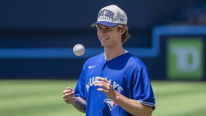 Jun 27, 2026; Toronto, Ontario, CAN;  Toronto Maple Leafs’ first overall pick of the NHL 2026 Draft Gavin McKenna looks on before a MLB game between the Toronto Blue Jays and Texas Rangers at Rogers Centre. Mandatory Credit: Kevin Sousa-Imagn Images