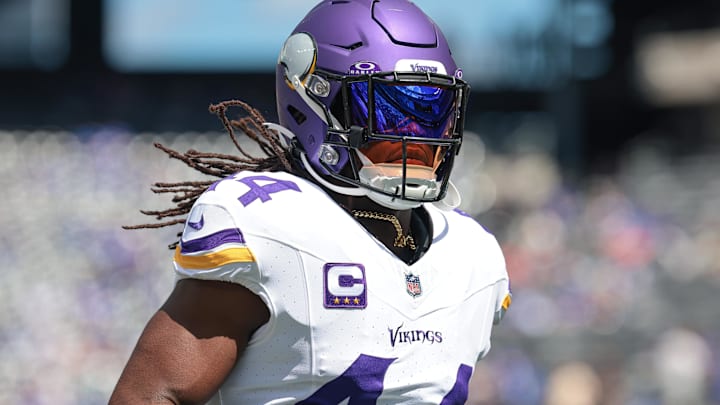 Sep 8, 2024; East Rutherford, New Jersey, USA; Minnesota Vikings safety Josh Metellus (44) runs up field before the game against the New York Giants at MetLife Stadium.