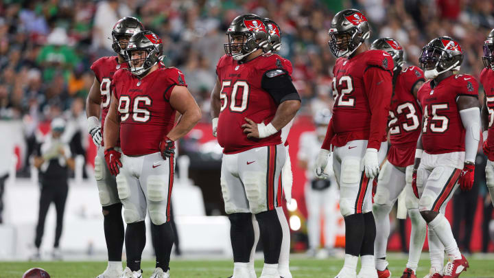 Sep 25, 2023; Tampa, Florida, USA;  Tampa Bay Buccaneers defensive tackle Vita Vea (50) defensive tackle Greg Gaines (96) and defensive end William Gholston (92) line up against the Philadelphia Eagles in the fourth quarter at Raymond James Stadium. Mandatory Credit: Nathan Ray Seebeck-USA TODAY Sports