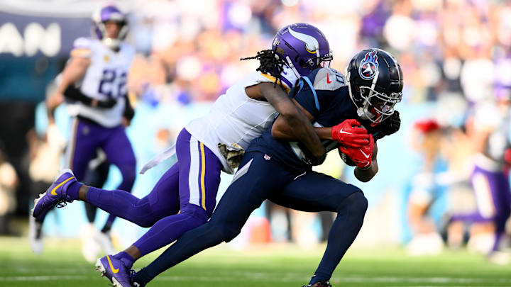 Nov 17, 2024; Nashville, Tennessee, USA; Minnesota Vikings cornerback Stephon Gilmore (2) tackles Tennessee Titans wide receiver Bryce Oliver (80) during the first half at Nissan Stadium. Nov 17, 2024; Nashville, Tennessee, USA; Minnesota Vikings cornerback Stephon Gilmore (2) tackles Tennessee Titans wide receiver Bryce Oliver (80) during the first half at Nissan Stadium.