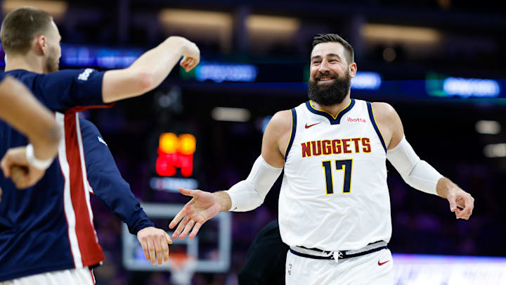 Nov 11, 2025; Sacramento, California, USA; Denver Nuggets center Jonas Valanciunas (17) smiles at teammates during the fourth quarter against the Sacramento Kings at Golden 1 Center. Mandatory Credit: Sergio Estrada-Imagn Images