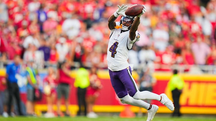 Sep 28, 2025; Kansas City, Missouri, USA; Baltimore Ravens wide receiver Zay Flowers (4) makes a catch during the fourth quarter against the Kansas City Chiefs at GEHA Field at Arrowhead Stadium. Sep 28, 2025; Kansas City, Missouri, USA; Baltimore Ravens wide receiver Zay Flowers (4) makes a catch during the fourth quarter against the Kansas City Chiefs at GEHA Field at Arrowhead Stadium.