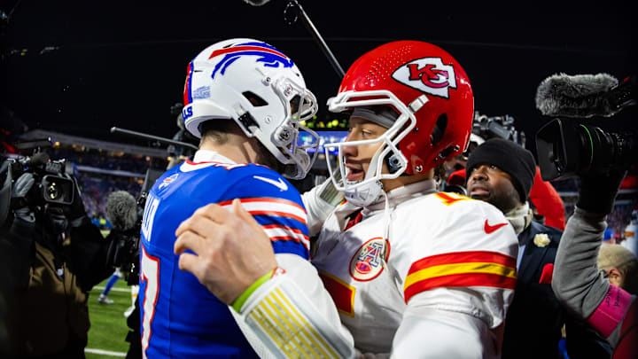 Kansas City Chiefs quarterback Patrick Mahomes (15) greets Buffalo Bills quarterback Josh Allen.