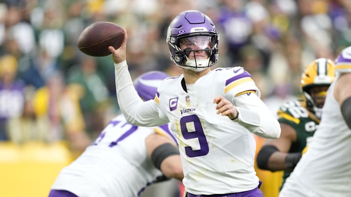 Nov 23, 2025; Green Bay, Wisconsin, USA; Minnesota Vikings quarterback J.J. McCarthy (9) throws the ball against the Green Bay Packers during the second half at Lambeau Field.