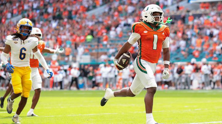 Oct 24, 2026; Miami Gardens, Florida, USA; Miami Hurricanes wide receiver Malachi Toney (1) scores a touchdown against the Pittsburgh Panthers during the second quarter at Hard Rock Stadium. Mandatory Credit: Sam Navarro-Imagn Images