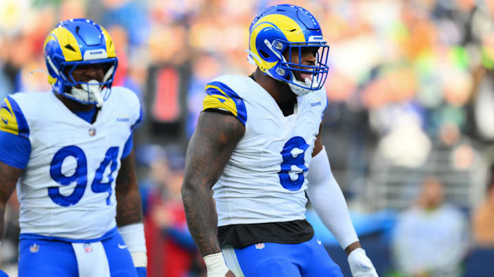 Nov 3, 2024; Seattle, Washington, USA; Los Angeles Rams linebacker Jared Verse (8) celebrates after sacking Seattle Seahawks quarterback Geno Smith (7) (not pictured) during the first half at Lumen Field. Mandatory Credit: Steven Bisig-Imagn Images