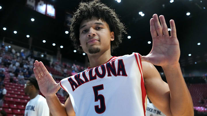 Mar 22, 2026; San Diego, CA, USA; Arizona Wildcats guard Brayden Burries (5) celebrates after defeating the Utah State Aggies during a second round game of the men's 2026 NCAA Tournament at Viejas Arena. Mandatory Credit: Kirby Lee-Imagn Images