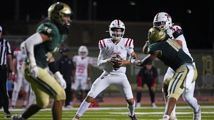 Millard South Jett Thomalla (4) looks for receivers against Basha during a game at Basha High School in Chandler on Aug. 30, 2024.