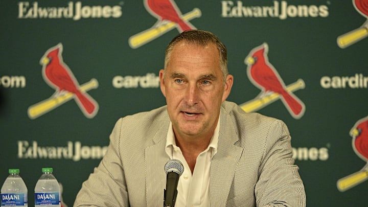 Jul 30, 2023; St. Louis, Missouri, USA; St. Louis Cardinals president of baseball operations John Mozeliak talks with the media after the Cardinals traded relief pitcher Jordan Hicks (not pictured) starting pitcher Jordan Montgomery (not pictured) and relief pitcher Chris Stratton (not pictured) at Busch Stadium. Mandatory Credit: Jeff Curry-Imagn Images Jul 30, 2023; St. Louis, Missouri, USA; St. Louis Cardinals president of baseball operations John Mozeliak talks with the media after the Cardinals traded relief pitcher Jordan Hicks (not pictured) starting pitcher Jordan Montgomery (not pictured) and relief pitcher Chris Stratton (not pictured) at Busch Stadium. Mandatory Credit: Jeff Curry-Imagn Images